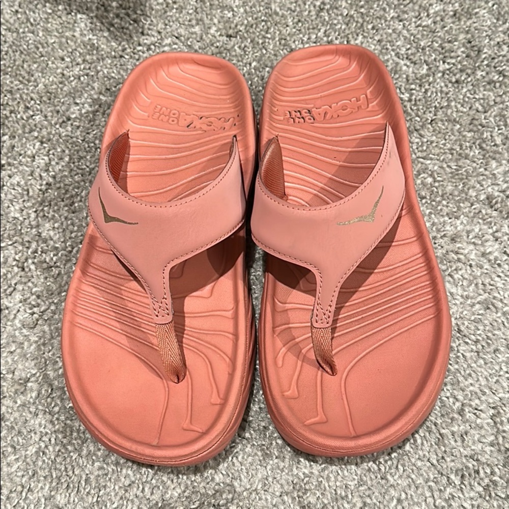 Pink hoka flip flops